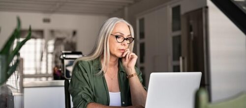 senior woman using laptop